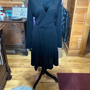 Black dress, tiered, beautiful never worn. Cross cross top